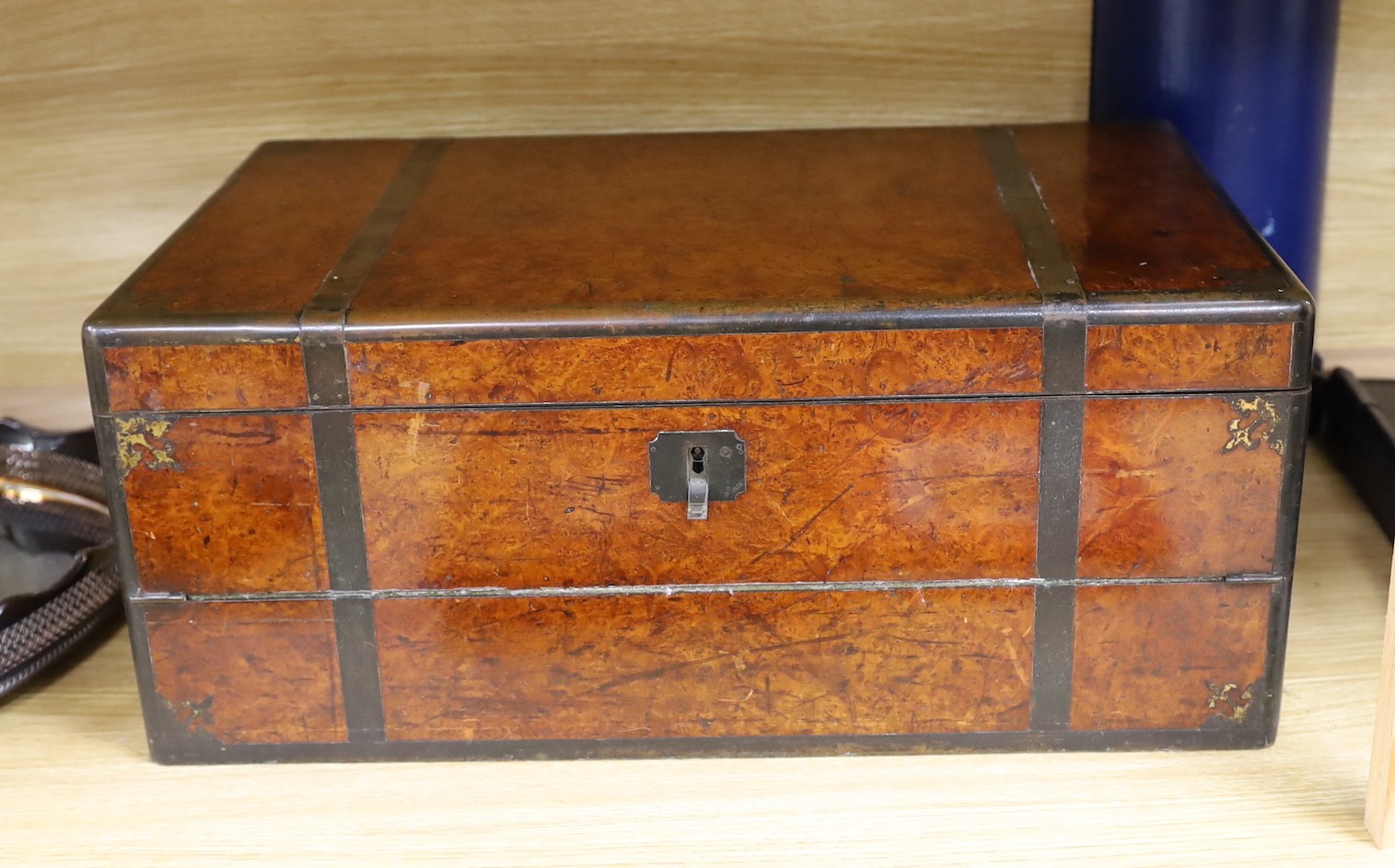 A rare large 19th century Chinese export amboyna veneered brass bound camphorwood and huanghuali writing slope, with green baize and red velvet lining,. 53cm wide